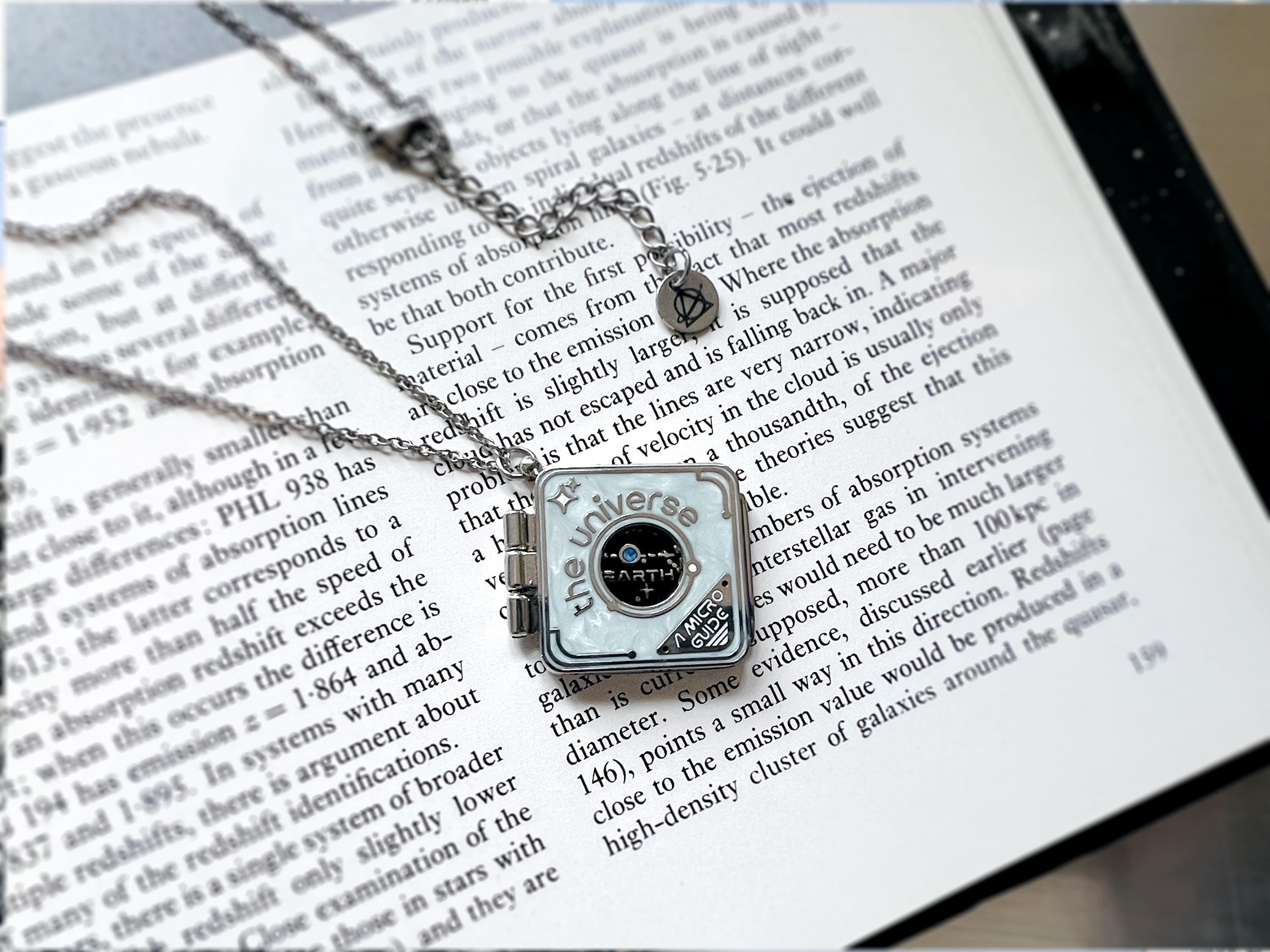 Universal Guide Book Locket Necklace - Futuristic / Interactive Event Horizon Space Pendant