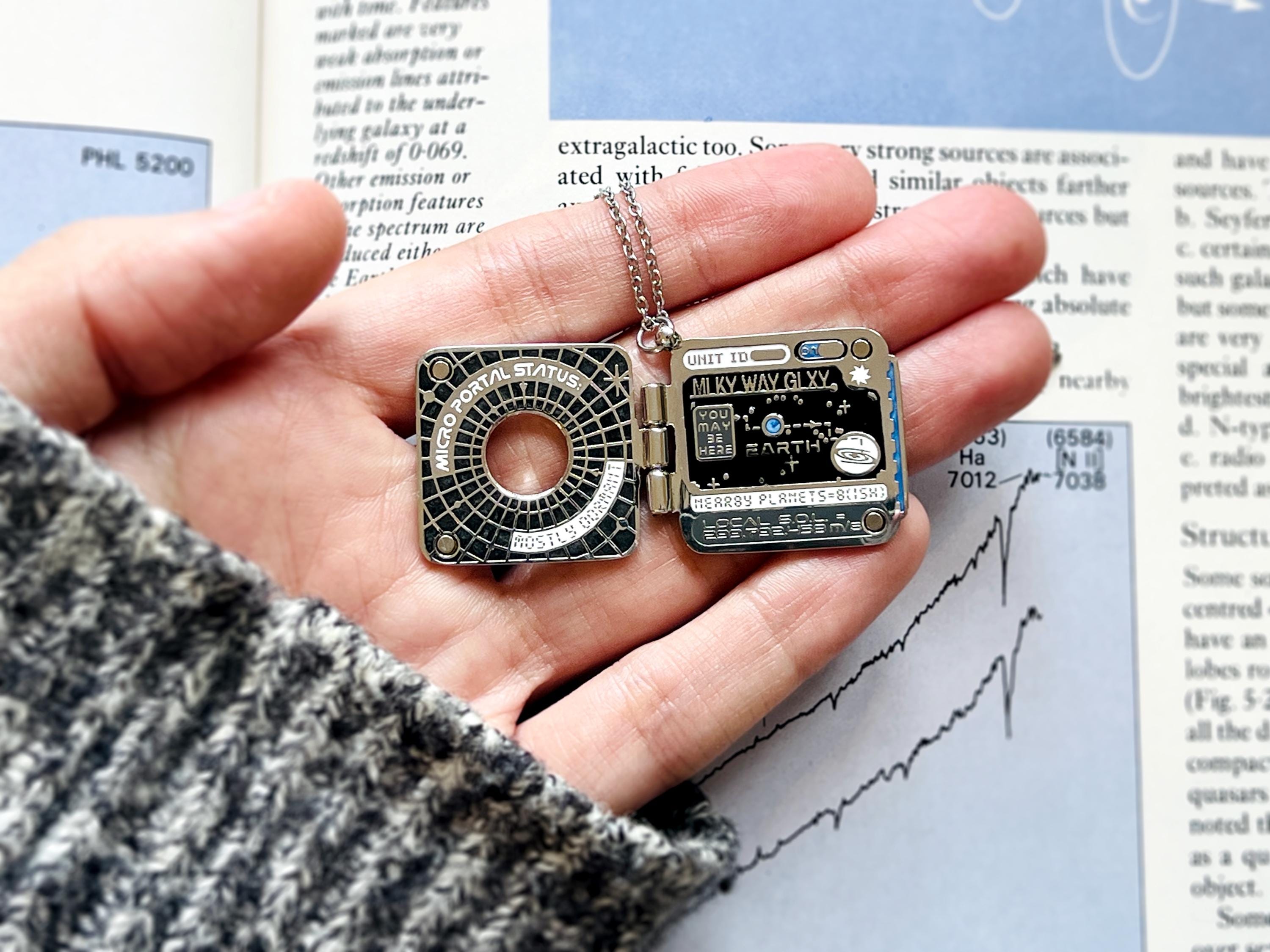 Universal Guide Book Locket Necklace - Futuristic / Interactive Event Horizon Space Pendant